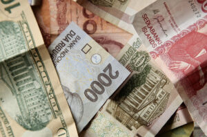 Kurangi Penggunaan Dolar, ASEAN Sepakat Gunakan Uang Lokal