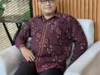 Otoritas Jasa Keuangan atau Perdagangan (juga)?